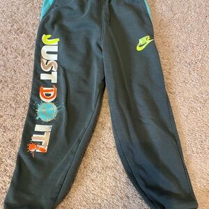 Nike Kids Forest Green Joggers with Colorful Print